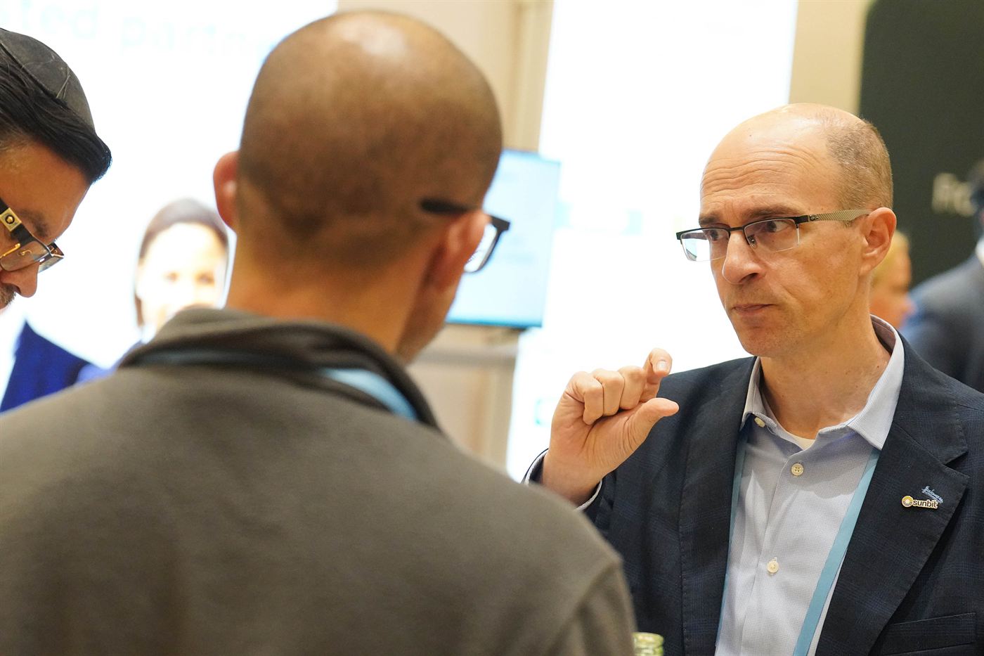 Two executives in conversation at Enterprise Dental Connect
